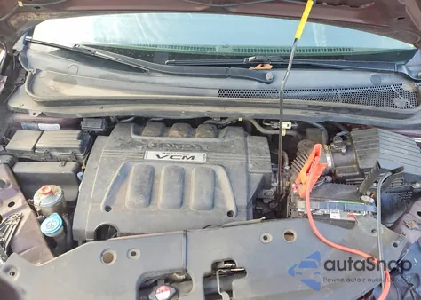 2010 Honda Odyssey Exl z USA, uszkodzony, nr VIN 5FNRL3H75AB058464